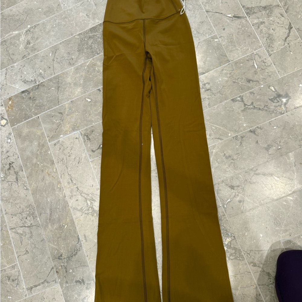 Vuori Brown flare leggings with Branded Tag